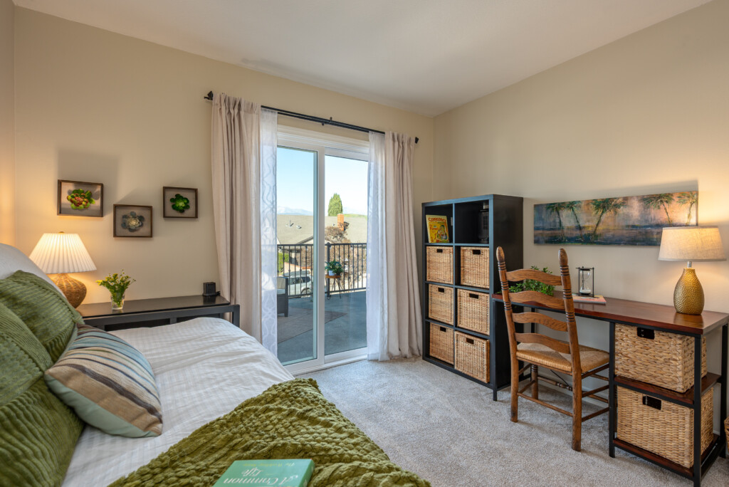 Bunk room perfect for families with work desk and storage.