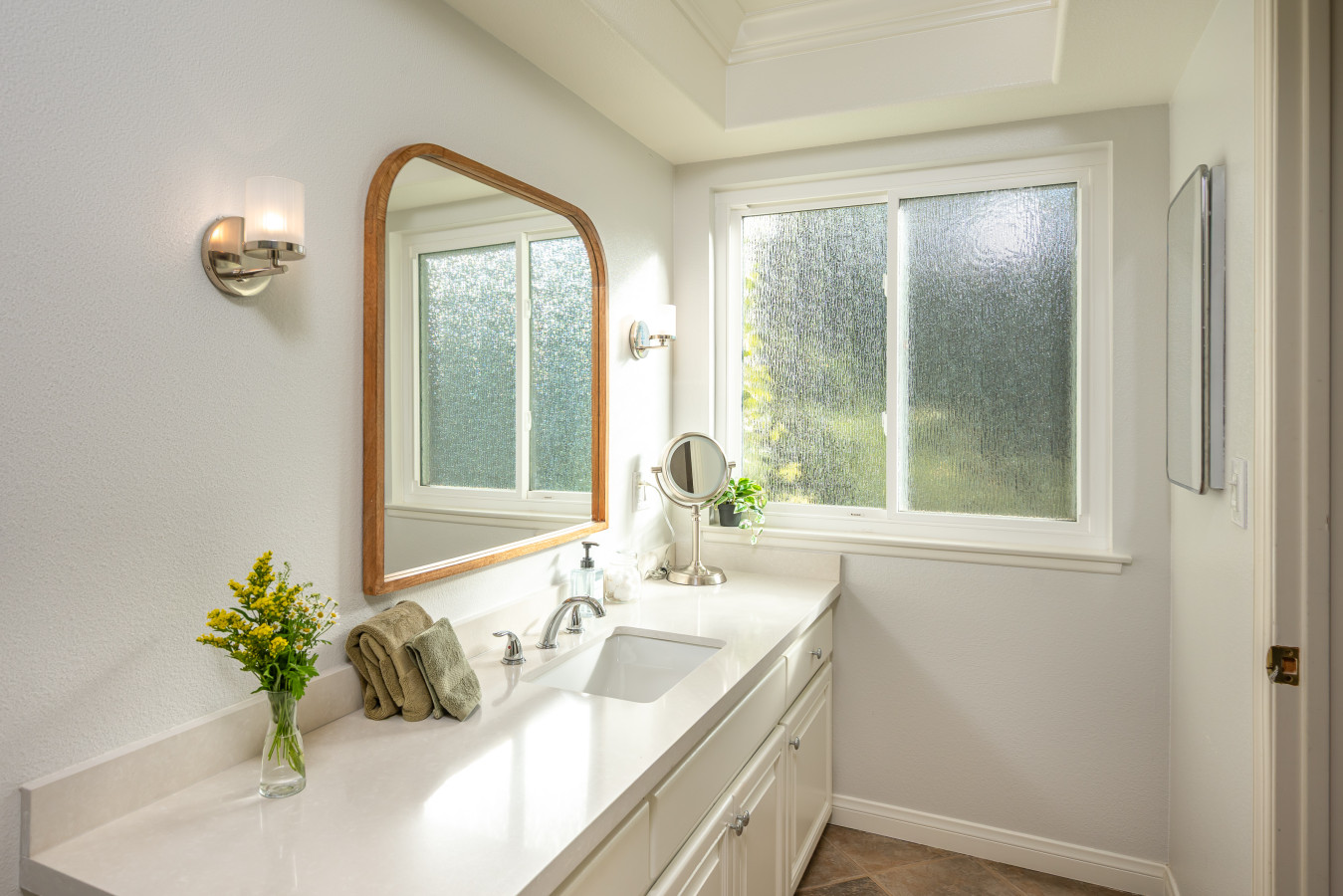 Bright vanity area with generous counter space and natural light, making daily routines easy and comfortable. A thoughtful touch for guests settling into longer stays in Diamond Bar.