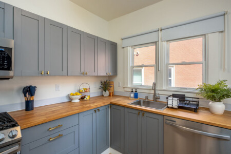 A clean, fully equipped kitchen with generous counter space and plenty of natural light. Perfect for settling into a routine, whether you’re cooking at home or starting your day with coffee by the window.