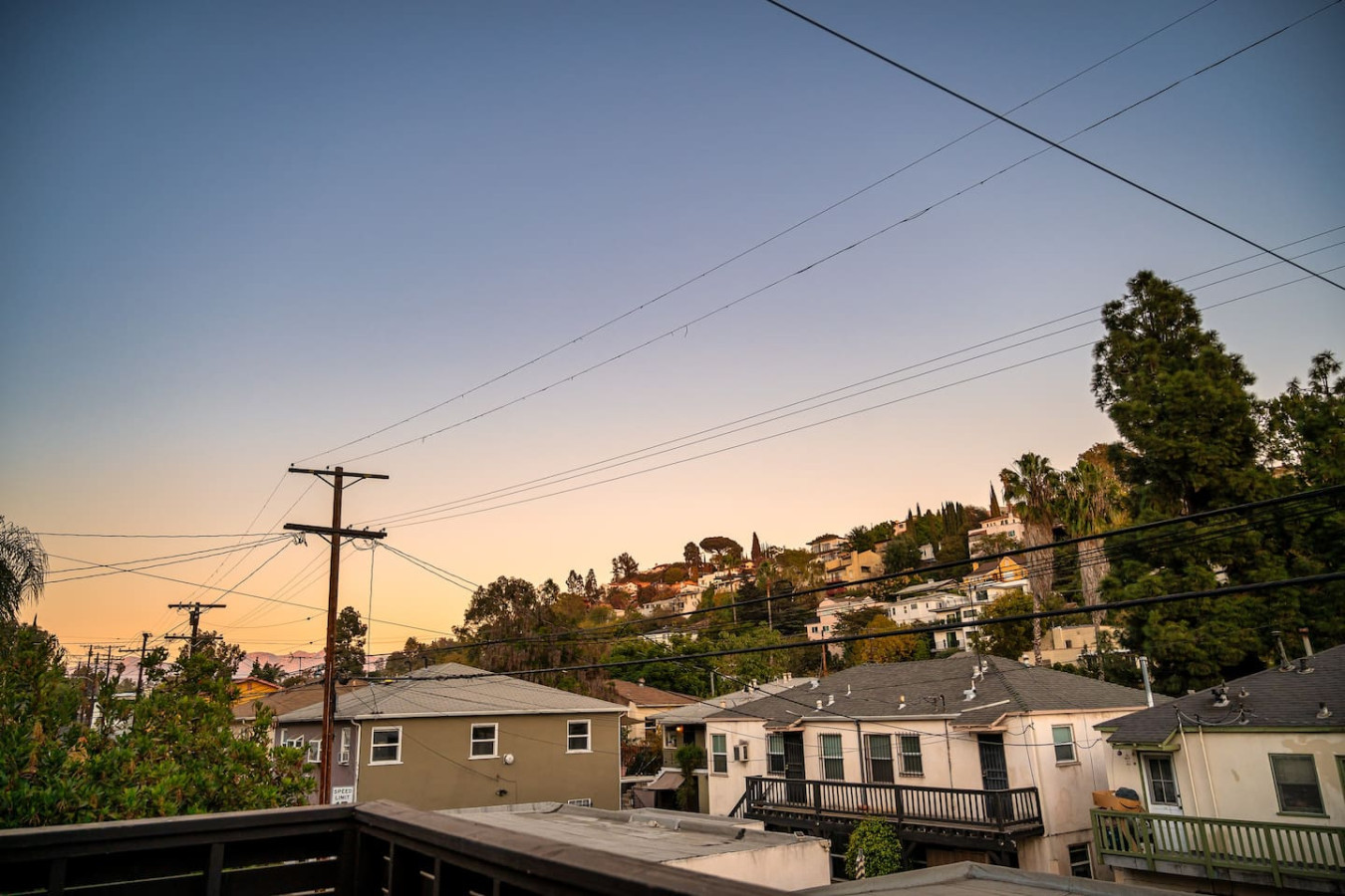 Hillside views of Silver Lake glow at sunset, bringing a sense of calm at the end of the day. A quiet reminder of the neighborhood you get to call home during your stay.