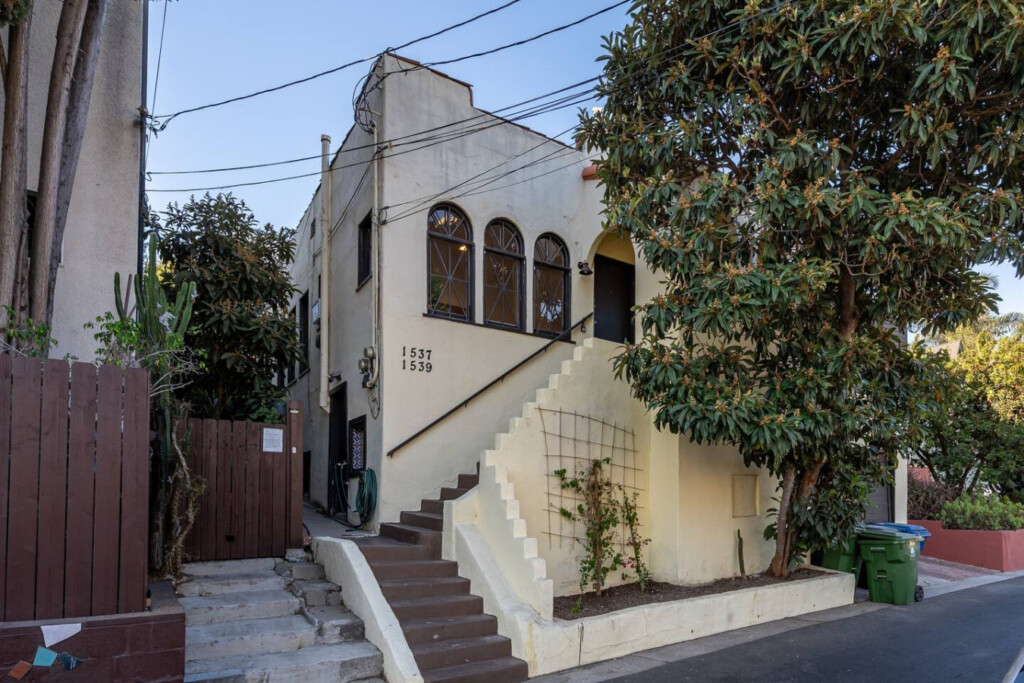 A classic 1925 Silver Lake home with charming architectural details and a welcoming street presence. From the moment you arrive, it feels like a place with history and character.